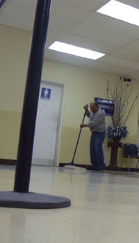 Partial Photo of Man Cleaning Floor