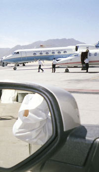 Partial Photo of Car Awaiting Official US Plane on Tarmac